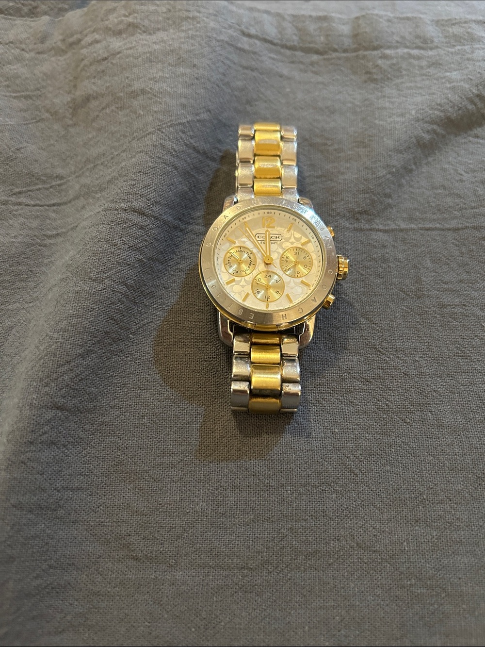 Vintage two tone Coach watch.  It’s heavy.  Works but needs battery